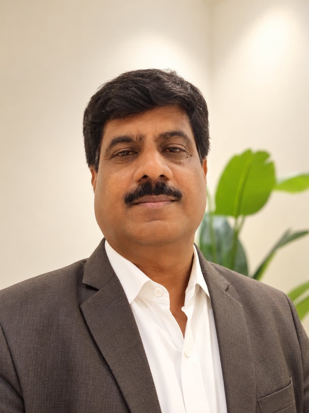 Portrait of Ravindra Adage, Founder & CEO of Global Infinite Green Power